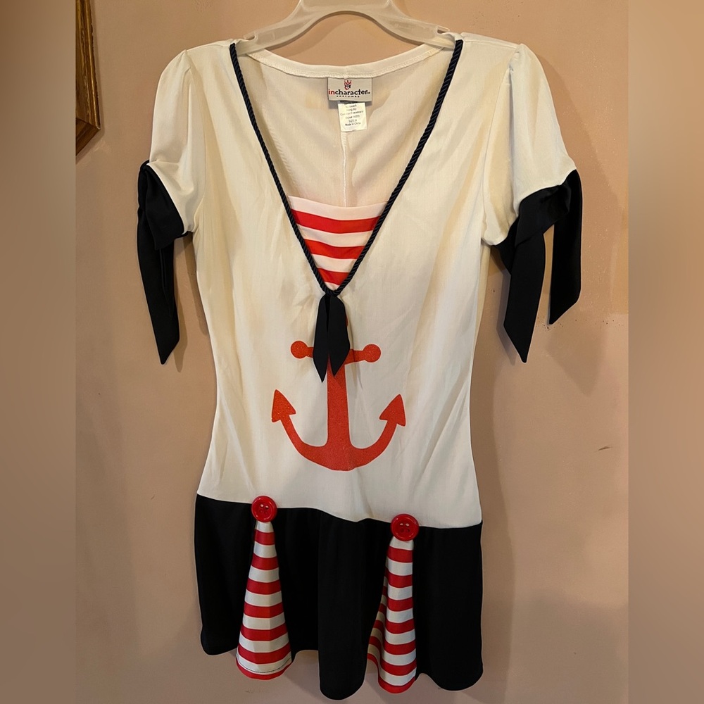 Girls’ sailor costume size medium by In Character.